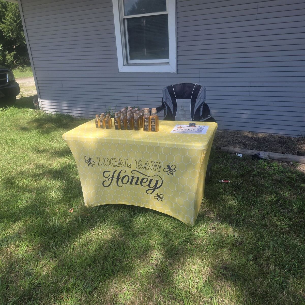Ends Honey Harvest roadside pop-up sale stand with bottled honey